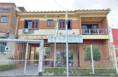 Casa residencial e comercial com 04 dormitórios 484m² área total- bairro cristal