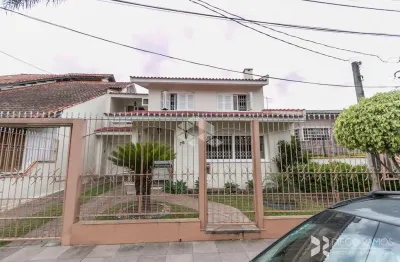 Casa com 4 quartos à venda na Rua Roque Gonzales, 76, Jardim Botânico, Porto Alegre