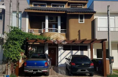 Casa em condomínio fechado com 3 quartos à venda na Rua Guatambu, 106, Hípica, Porto Alegre