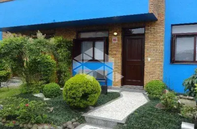 Casa em condomínio fechado com 3 quartos à venda na Avenida Vicente Monteggia, 2212, Cavalhada, Porto Alegre