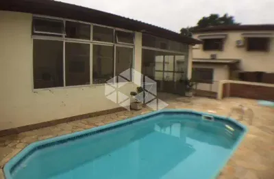 Casa com 4 quartos à venda na Rua Cangussu, 612, Nonoai, Porto Alegre