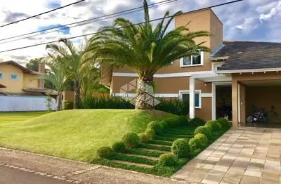 Casa em condomínio fechado com 4 quartos à venda na Avenida Juca Batista, 8000, Belém Novo, Porto Alegre