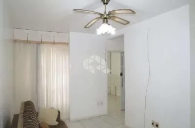 1 dormitório com moveis planejados desocupado em rua calma próximo ao zaffari