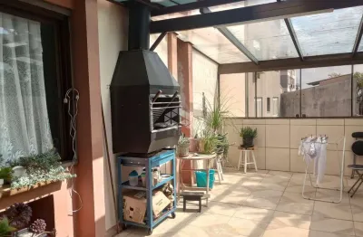 Apartamento garden com churrasqueira, dois banheiros, vaga de garagem