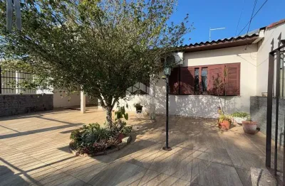 Casa 3 domitórios centro gravataí com pátio e garagem pra 2 carros