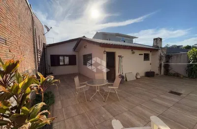 Casa 3 domitórios centro gravataí com pátio e garagem pra 2 carros