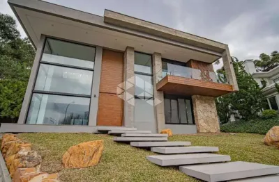 Casa de alto padrão no alphaville gramado - 4 suítes e vista exclusiva