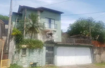 Casa com 2 quartos à venda na Acesso Marcelino Barski, 184, Jardim Itu Sabará, Porto Alegre