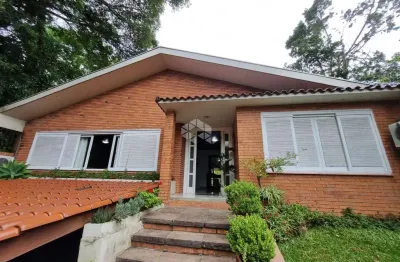 Casa com 4 quartos à venda na Avenida Guaíba, 4176, Vila Assunção, Porto Alegre