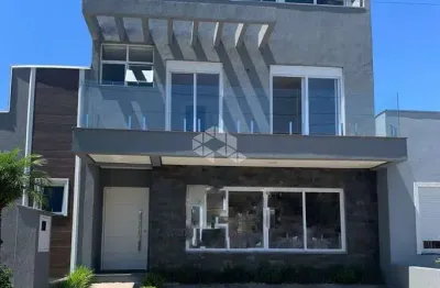 Casa em condomínio fechado com 4 quartos à venda na Rua Eroni Soares Machado, 300, Hípica, Porto Alegre