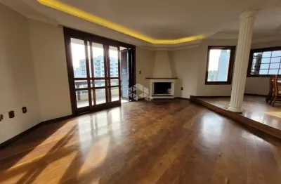 Apartamento semimobiliado central com 04 dormitórios, 02 vagas em caxias do sul