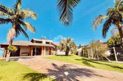 Magnífica casa mobiliada com 04 dormitórios sendo 01 suíte em amplo terreno de 1.738m² no bairro primavera na cidade de dois irmãos/rs.