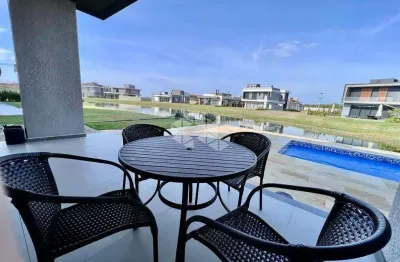 Casa mobiliada, plana, 03 suítes no condomínio costa serena em capão da canoa