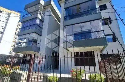 Apartamento à venda no Bairro Madureira, com dois dormitórios, sacada e churrasqueira.