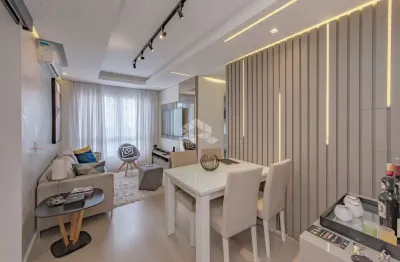 Apartamento de dois dormitórios com vaga de garagem no bairro partenon.