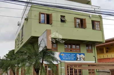 Prédio residencial com 3 apartamentos e 1 sala comercial no bairro moinhos de vento em canoas