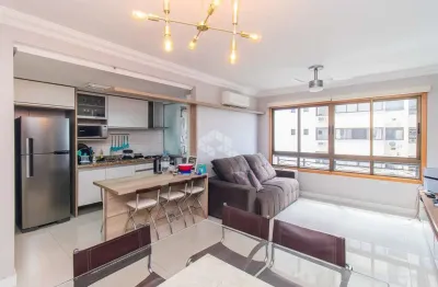 Apartamento semi-mobiliado com 2 dormitórios e 2 vagas no passo da areia