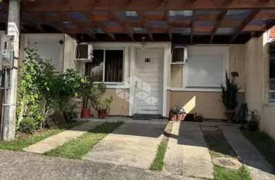 Casa em condomínio fechado com 2 quartos à venda na Rua Oscar Schick, 1911, Formoza, Alvorada