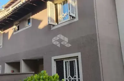 Casa em condomínio fechado com 3 quartos à venda na Rua Fermino Correa da Gama, 200, Vila Monte Carlo, Cachoeirinha
