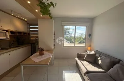 Apartamento de 1 dorm semimobiliado próx orla com sacada e vista para o guaíba