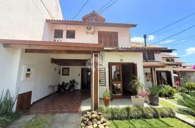 Casa em condomínio fechado com 3 quartos à venda na Avenida Eduardo Prado, 695, Cavalhada, Porto Alegre