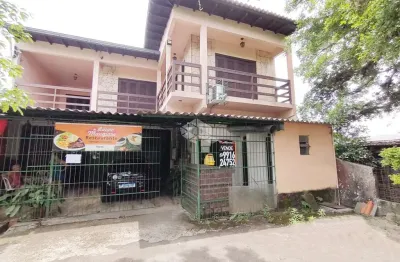 Prédio comercial e residencial de 02 pisos com 460m²  no bairro restinga em porto alegre