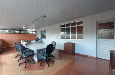 PRÉDIO COMERCIAL COM 400m² COM 3 LOJAS, 3 SALAS COMERCIAIS, DEPÓSITO E 3 VAGAS - SANTA MARIA GORETTI