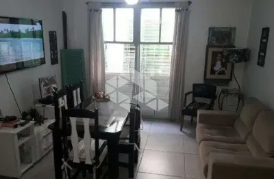 Apartamento 2 dormitórios, térreo com pátio privativo e vaga no Bairro Jardim Carvalho em Porto Alegre.