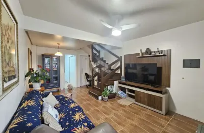 Casa  2 quartos/dornitórios  semimobiliada em condomínio, na rua pistóia,  a venda no bairro fátima, em canoas