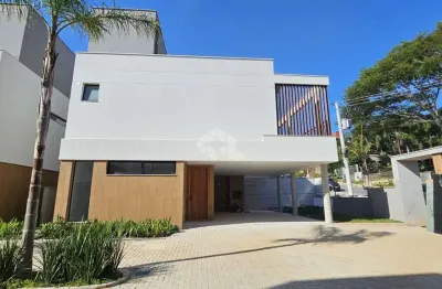Casa em condomínio fechado com 3 quartos à venda na Rodovia Haroldo Soares Glavan, 1408, Cacupé, Florianópolis