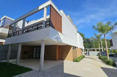 Casa residencial em condomínio fechado no bairro cacupé, florianópolis-sc
