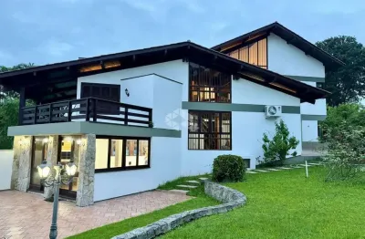 Casa em condomínio fechado com 4 quartos à venda no cacupé, florianópolis por r$ 2.900.000