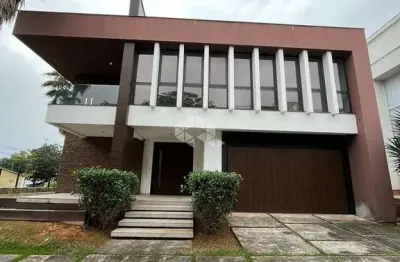 Casa em condomínio fechado com 3 quartos à venda na Rodovia Haroldo Soares Glavan, 3950, Cacupé, Florianópolis