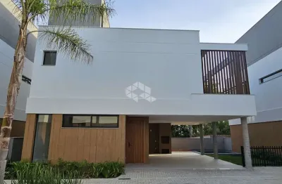Casa residencial com 3 suítes em condomínio fechado no bairro cacupé, florianópolis-sc