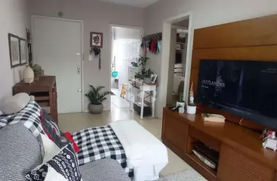 Apartamento 2 dormitórios semi mobiliado passo da areia