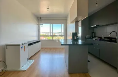 Apartamnento 2 dormitórios, 1 suite, churrasqueira, garagem dupla e predio com infra.