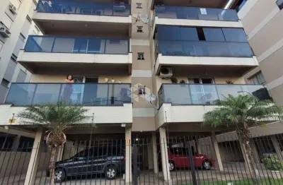Apartemento semi mobiliado com 64 m²,  2 dormitórios, sacada,  living amplo,  vagas cobertas e elevador no centro de são leopoldo rs.
