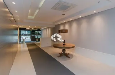 Sala comercial à venda já alugada oportunidade para investidor, com 1 vaga de garagem no bairro boa vista - porto alegre/rs