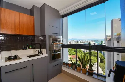 Apartamento com vista para o mar 2 suítes 2 vagas e ponto para carro elétrico na agronômica