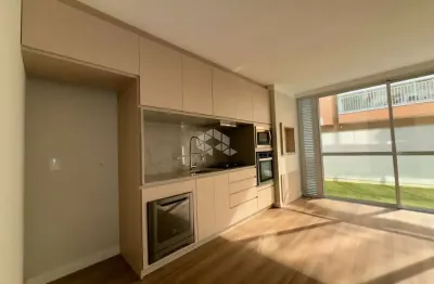 Apartamento garden semimobiliado com 2 suítes e 1 vaga de garagem no bairro ingleses em florianópolis/sc