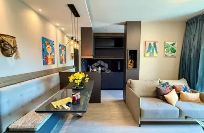 Apartamento mobiliado de 1 quarto sendo suíte com 2 vagas e sacada na praia comprida são josé