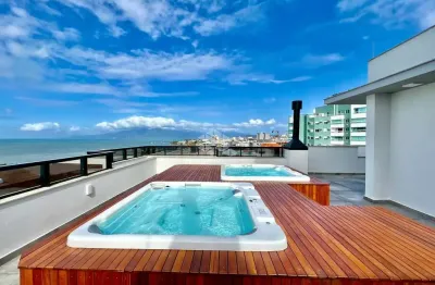 Apartamento com 3 quartos sendo 2 suítes e vagas de garagem em coqueiros florianópolis