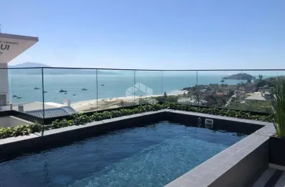 Apartamento à venda em canasvieiras florianópolis com 1 quarto 1 vaga de garagem e vista para o mar
