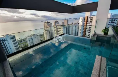 Apartamento à venda em florianópolis com 2 suítes 1 vaga de garagem e vista parcial mar