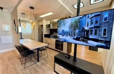 Apartamento mobiliado com 2 quartos sendo 1 suíte e 2 vagas em coqueiros pronto para morar