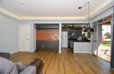 Apartamento com 2 quartos sendo 1 suíte e sacada com churrasqueira em coqueiros florianópolis