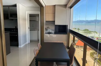 Apartamento semimobiliado com 3 quartos sendo 1 suíte 2 vagas e vista para o mar no estreito florianópolis