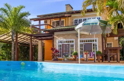Casa à venda em condomínio fechado em ibiraquera - imbituba/sc com 4 dormitórios