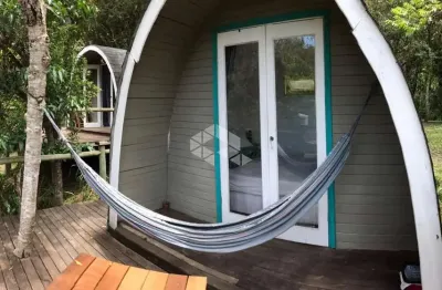 Terreno à venda em garopaba com 4 cabanas no morro da encantada