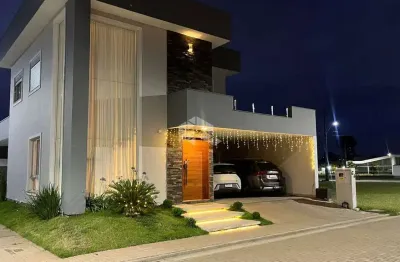 Casa à venda em condomínio fechado em eldorado do sul com 3 dormitórios e 2 vagas